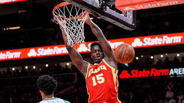 Clint Capela dunks the ball.